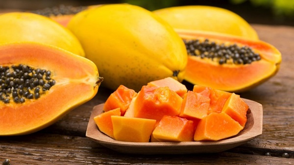unripe papaya side effects